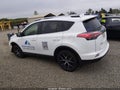 2018 Toyota RAV4 — photo 14 of 16 | VIN JTMJFREV5JJ241382