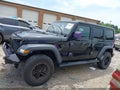 2022 Jeep Wrangler Unlimited — photo 14 of 16 | VIN 1C4HJXDG5NW251326