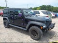2022 Jeep Wrangler Unlimited — photo 1 of 16 | VIN 1C4HJXDG5NW251326