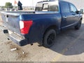 2018 Nissan Titan — photo 4 of 17 | VIN 1N6AA1E57JN532973