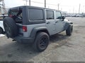 2015 Jeep Wrangler Unlimited — photo 4 of 17 | VIN 1C4BJWDGXFL577920