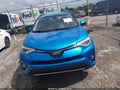 2016 Toyota RAV4 Hybrid — photo 12 of 16 | VIN JTMDJREV4GD007639