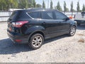 2018 Ford Escape — photo 4 of 16 | VIN 1FMCU9GD2JUB53371