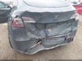 2023 Tesla Model Y — photo 6 of 16 | VIN 7SAYGDEF6PF968119