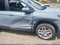 2024 Honda Passport — photo 6 of 16 | VIN 5FNYF8H54RB020492