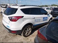 2018 Ford Escape — photo 4 of 18 | VIN 1FMCU0GD8JUB21357
