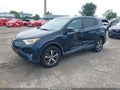 2017 Toyota RAV4 — photo 2 of 15 | VIN 2T3RFREV6HW694831
