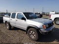 2000 Nissan Frontier — photo 1 of 11 | VIN 1N6ED27Y6YC331450