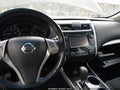 2013 Nissan Altima — photo 12 of 14 | VIN 1N4AL3AP0DN583953