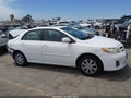 2011 Toyota Corolla — photo 13 of 16 | VIN 2T1BU4EE8BC690615