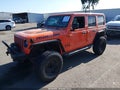 2018 Jeep Wrangler Unlimited — photo 2 of 16 | VIN 1C4HJXFN4JW239450