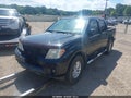 2018 Nissan Frontier — photo 2 of 21 | VIN 1N6DD0ER2JN713514