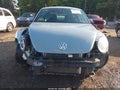 2012 Volkswagen Beetle — photo 13 of 17 | VIN 3VWJP7AT4CM637859
