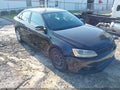 2014 Volkswagen Jetta — photo 1 of 17 | VIN 3VWD07AJ9EM439250