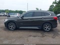 2017 BMW X1 — photo 14 of 16 | VIN WBXHT3C33H5F73206