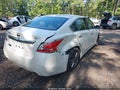 2014 Nissan Altima — photo 4 of 17 | VIN 1N4BL3AP3EC204557