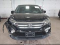 2016 Honda Pilot — photo 12 of 16 | VIN 5FNYF6H70GB126389