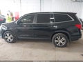 2016 Honda Pilot — photo 14 of 16 | VIN 5FNYF6H70GB126389