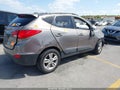 2012 Hyundai Tucson — photo 4 of 17 | VIN KM8JU3AC4CU322393