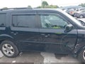 2012 Honda Pilot — photo 13 of 16 | VIN 5FNYF4H59CB047977