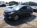 2012 Hyundai Elantra — photo 2 of 16 | VIN KMHDH4AE0CU298621