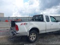 2002 Ford F-150 — photo 6 of 16 | VIN 1FTRX18L02NA13361