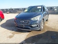2017 Hyundai Santa Fe — photo 2 of 16 | VIN 5NMZU3LB8HH025914