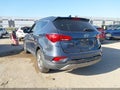 2017 Hyundai Santa Fe — photo 3 of 16 | VIN 5NMZU3LB8HH025914