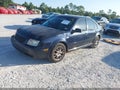 2000 Volkswagen Jetta — photo 2 of 17 | VIN 3VWSF29M5YM111108