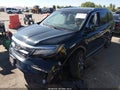 2019 Honda Pilot — photo 2 of 17 | VIN 5FNYF6H99KB036782