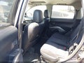 2010 Mitsubishi Outlander — photo 8 of 13 | VIN JA4JT3AW5AZ014676