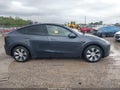 2022 Tesla Model Y — photo 12 of 15 | VIN 7SAYGDEE1NF455204