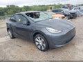 2022 Tesla Model Y — photo 1 of 15 | VIN 7SAYGDEE1NF455204