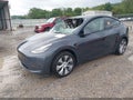 2022 Tesla Model Y — photo 2 of 15 | VIN 7SAYGDEE1NF455204
