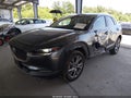 2023 Mazda CX-30 — photo 2 of 16 | VIN 3MVDMBBM2PM532891