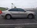 2015 Volkswagen Passat — photo 13 of 16 | VIN 1VWAT7A38FC048346