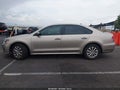 2015 Volkswagen Passat — photo 14 of 16 | VIN 1VWAT7A38FC048346