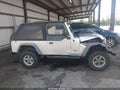 2004 Jeep Wrangler Unlimited — photo 13 of 16 | VIN 1J4FA49S04P763811
