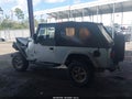 2004 Jeep Wrangler Unlimited — photo 14 of 16 | VIN 1J4FA49S04P763811