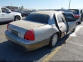 2003 Lincoln Town Car — photo 4 of 16 | VIN 1LNHM82W23Y644639