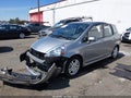 2007 Honda Fit — photo 2 of 16 | VIN JHMGD38697S054925