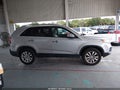 2011 Kia Sorento — photo 13 of 16 | VIN 5XYKTDA28BG060144