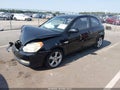 2007 Hyundai Accent — photo 2 of 15 | VIN KMHCN36C77U027048