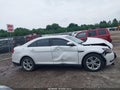 2014 Ford Taurus — photo 14 of 17 | VIN 1FAHP2E8XEG152381