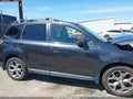 2015 Subaru Forester — photo 13 of 16 | VIN JF2SJAUC1FH566907
