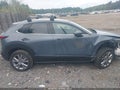 2020 Mazda CX-30 — photo 13 of 16 | VIN 3MVDMBEM2LM114529