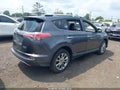 2016 Toyota RAV4 Hybrid — photo 4 of 16 | VIN JTMDJREV4GD049065