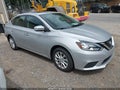 2018 Nissan Sentra — photo 1 of 17 | VIN 3N1AB7AP7JY215923