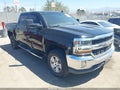 2018 Chevrolet Silverado 1500 — photo 1 of 19 | VIN 3GCUKREC6JG159931