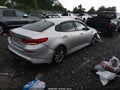 2019 Kia Optima — photo 4 of 15 | VIN 5XXGT4L31KG314020
